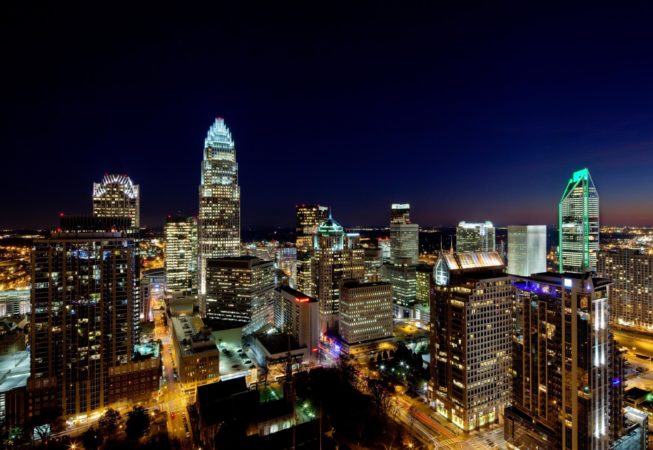Close-in photography of the Charlotte NC skyline, taken at sunset (series of images shows sky changing colors as the sun falls below the horizon). Image includes the new Duke Energy Tower (shown far right).